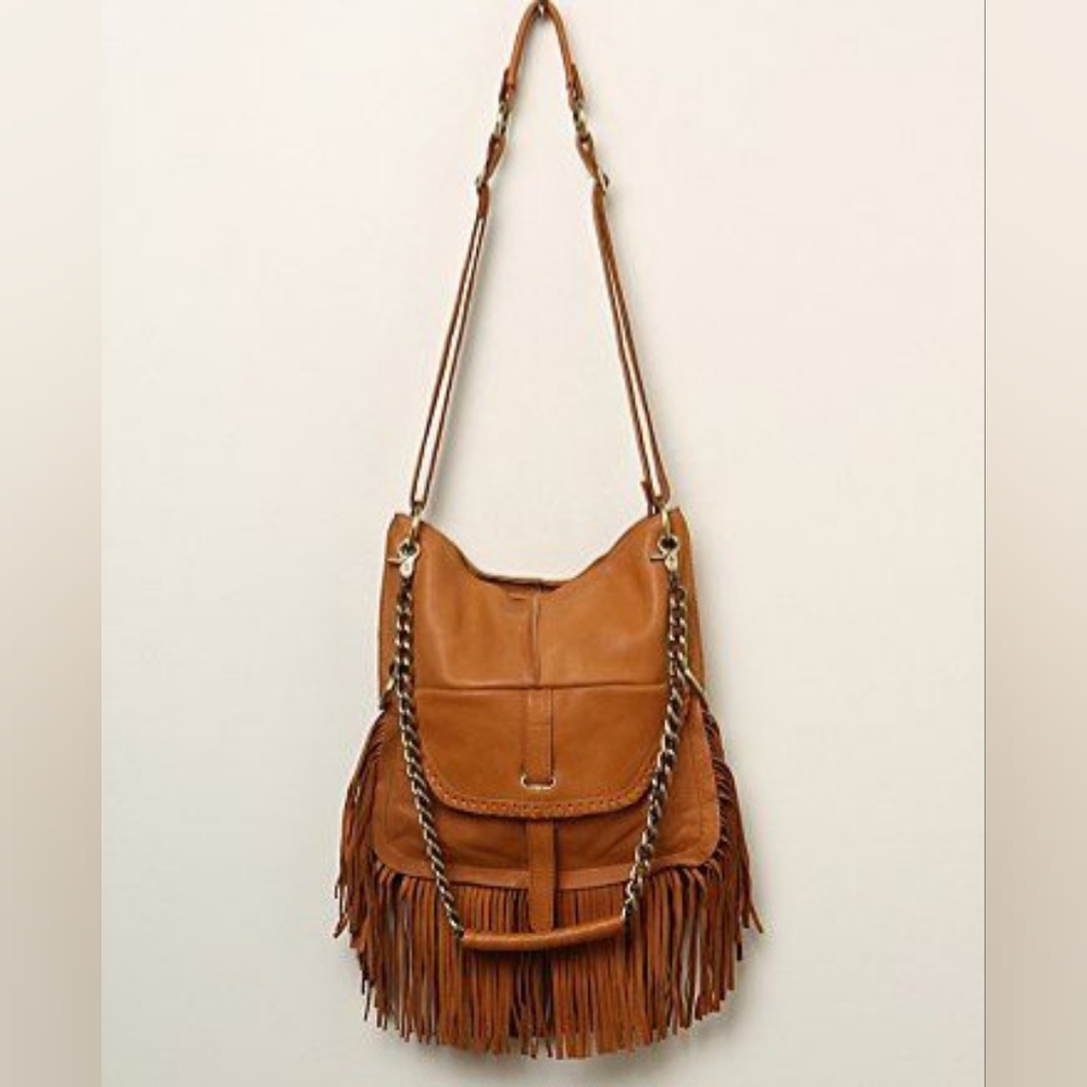 Leather “cut n paste” boho purse.
